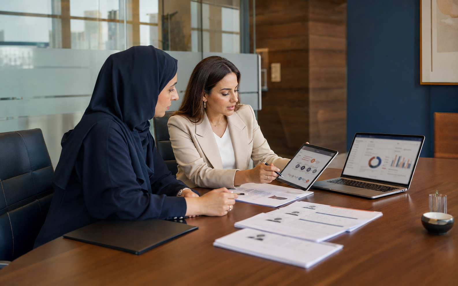 HR manager and RPO consultant reviewing candidate profiles and hiring priorities